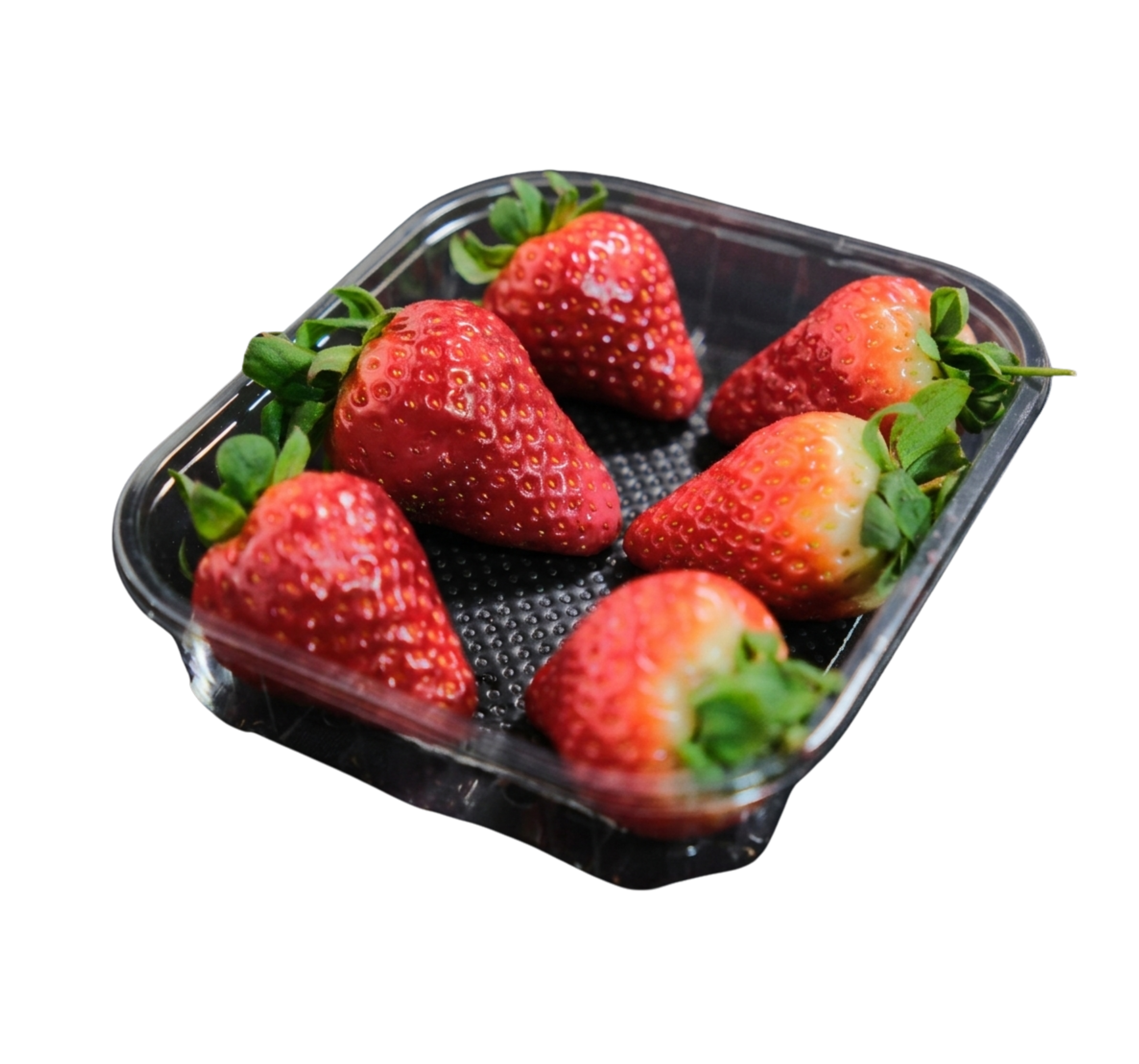 Axorbia Fruit Pad under fresh strawberries in a punnet